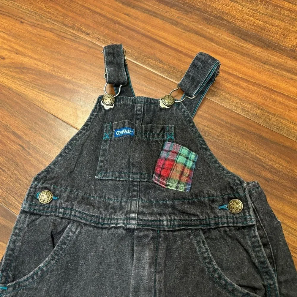 Osh Kosh B’Gosh Vintage black denim overalls with plaid accents.